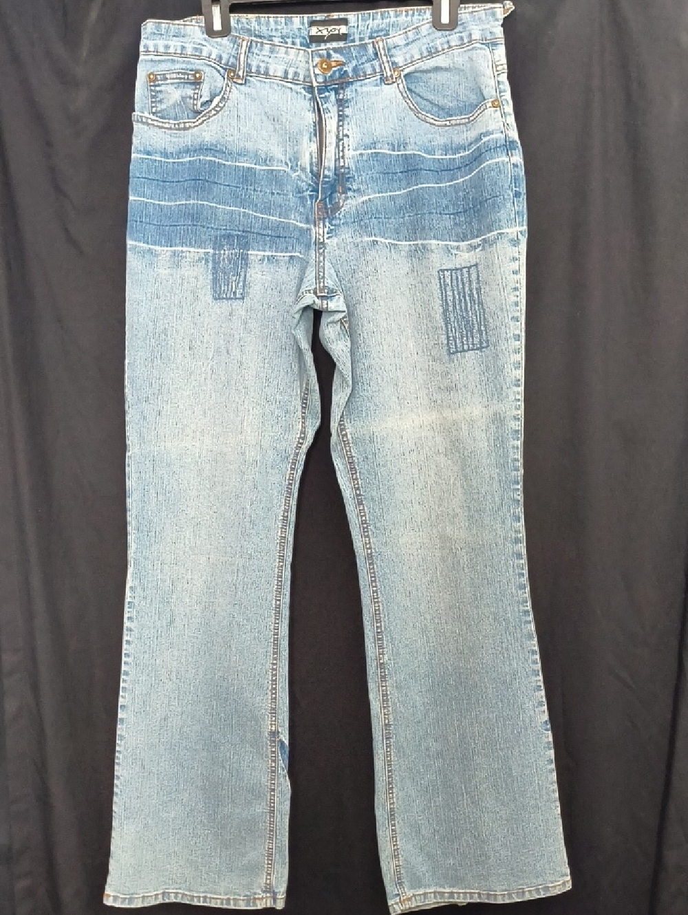 Women’s Light Blue Distressed Jeans Item #0038